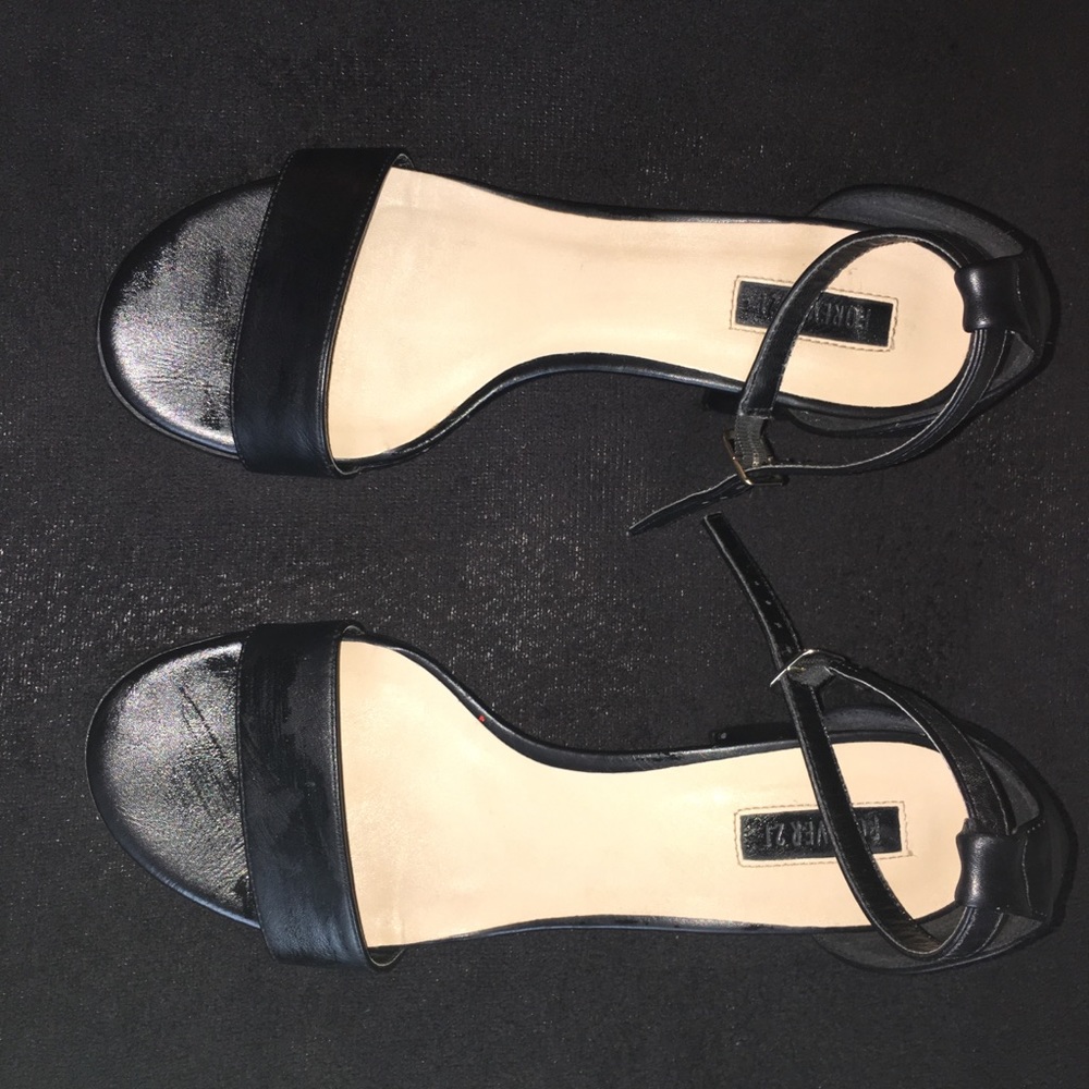 ‘Black leather block heel’